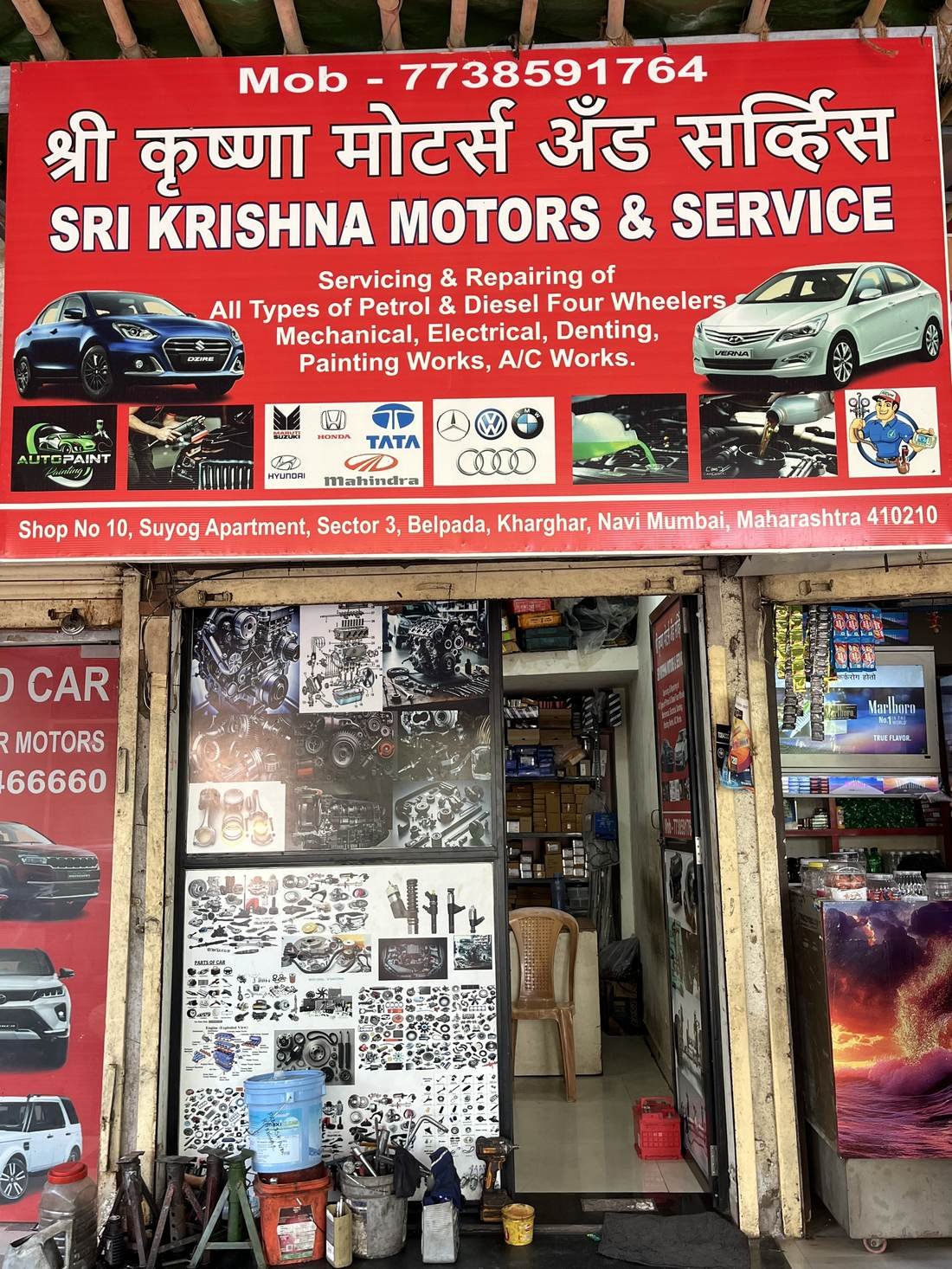 Sri Krishna Motors & Service car repair workshop signboard and storefront in Belpada, Kharghar
